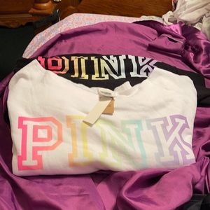 Pink off shoulder sweater jacket and black joggers